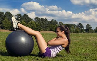 Woman Stretching on Balance Ball