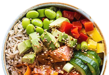 A vibrant bowl filled with fluffy brown rice topped with fresh salmon, creamy avocado cubes, crisp cucumber slices, and colorful red, yellow, and green bell peppers. Edamame beans add a pop of color, while sesame seeds sprinkle on top for texture, creating a visually appealing, healthy dish.